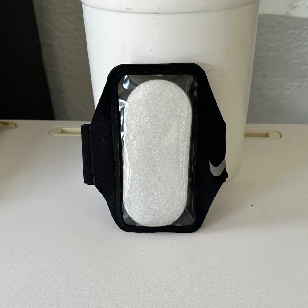 Nike Black Armband Phone Case with Silver Swoosh For That Active Workout.